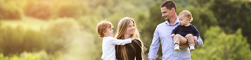 Family of mom, dad, and two young boys